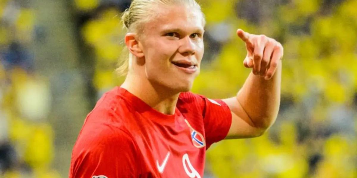 With a wooden shield and wielding an axe, Erling Haaland transforms into a viking.