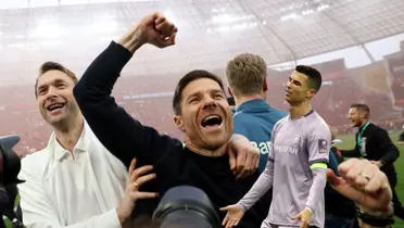 Xabi Alonso celebrates Bayer Leverkusen's title while Cristiano Ronaldo is upset with Al Nassr.