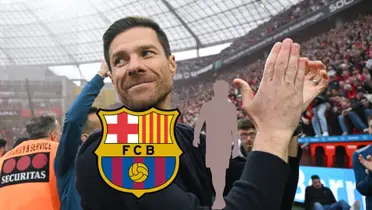 Xabi Alonso claps to the Bayer Leverkusen fans after they won the Bundesliga.